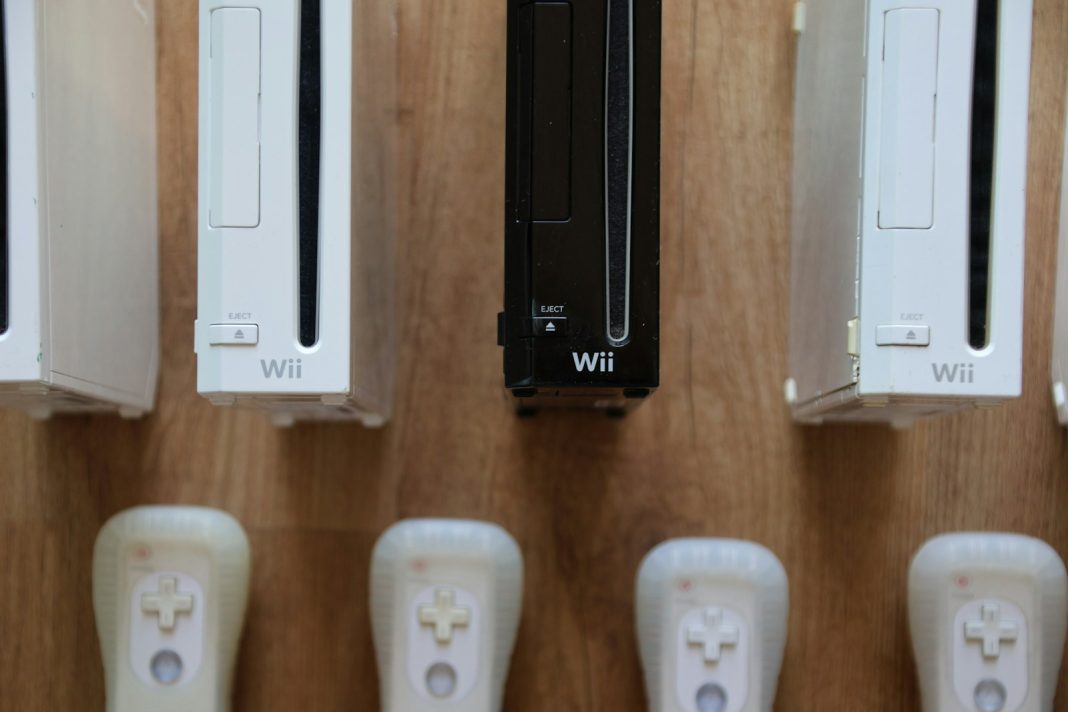 a row of wii remotes sitting next to each other